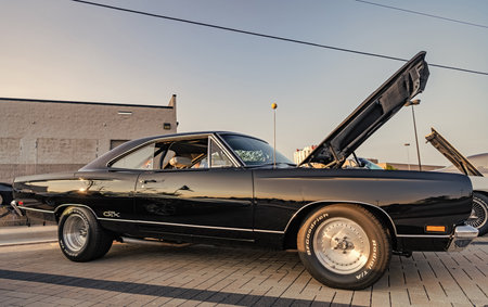Park Ridge, Illinois, USA - August 22, 2024: Chevy Monte Carlo. Black car parked at auto show, corner view. Chevrolet Monte Carlo car. Black car of Chevrolet Monte Carloのeditorial素材