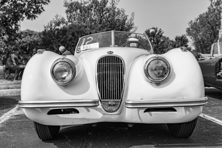 Chicago, Illinois, USA - September 08, 2024: Jaguar XK120 retro convertible vehicle, front view. Retro sportscar. Convertible Jaguar XK120 car. Jaguar XK120 at Chicagoのeditorial素材