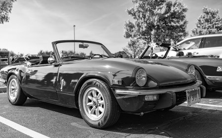 Chicago, Illinois, USA - September 08, 2024: Triumph Spitfire retro convertible sportscar, side view. Retro pink car. Retro Triumph Spitfire car. Convertible Triumph Spitfire at Chicagoのeditorial素材