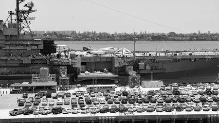 San Diego, California, USA - May 17, 2019: Midway aircraft carrier museum of USA naval. Military ship. Midway aircraft carrier museum, United States Navy. Aircraft carrier navy ship and car parkingのeditorial素材