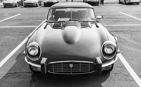 Chicago, Illinois, USA - September 08, 2024: Jaguar E Type 1974 retro sportscar convertible vehicle, front view. Retro sportscar. Convertible Jaguar E Type car. Jaguar E Type at Chicagoのeditorial素材