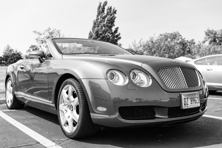 Chicago, Illinois, USA - September 08, 2024: 2007 Bentley Continental GTC convertible car, corner view. Luxurious grey car. Bentley Continental GTC car. metallic grey Bentley Continental GTC at Chicagoのeditorial素材