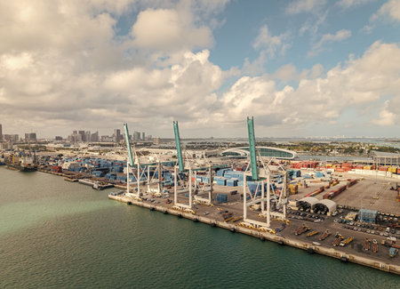 Miami, Florida - February 12, 2025: Cargo shipping container in Miami, aerial. Freight container, maritime. Aerial Miami port with cargo container. Maritime shipping. Port of Miami. Commercial portのeditorial素材