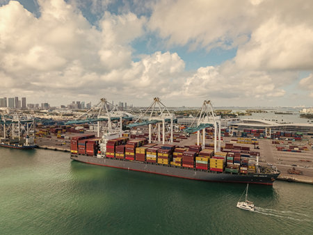 Miami, Florida - February 12, 2025: Freight container. Aerial Miami port with cargo container. Export and import. Port of Miami. Cargo ship loaded with container in Miami, aerial. Cargo portのeditorial素材