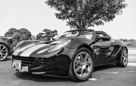 Chicago, Illinois, USA - September 08, 2024: 2008 Lotus Elise SC sportscar convertible vehicle, corner view. Black sportscar. Convertible Lotus Elise SC car. Lotus Elise SC at Chicago Auto Showのeditorial素材