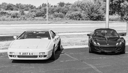 Chicago, Illinois, USA - September 08, 2024: Lotus Esprit S4S model 1995 retro sportscar, corner view and Lotus Elise . Retro yellow car. Lotus Esprit S4S vehicle Lotus at Chicago and Lotus Eliseのeditorial素材