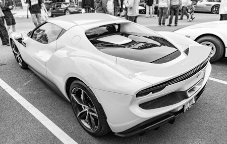 Chicago, Illinois - September 29, 2024: Ferrari 296 GTS or GTB yellow color. Ferrari 296 GTS or GTB parked on the street. corner view. Luxury Ferrari 296 GTS or GTB in Chicagoのeditorial素材