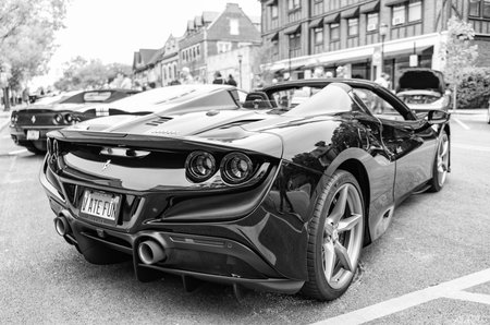 Chicago, Illinois - September 29, 2024: Ferrari F8 Spider or Tributo black color. Ferrari F8 Spider or Tributo parked on the street. back view. Luxury Ferrari F8 Spider or Tributo in Chicagoのeditorial素材