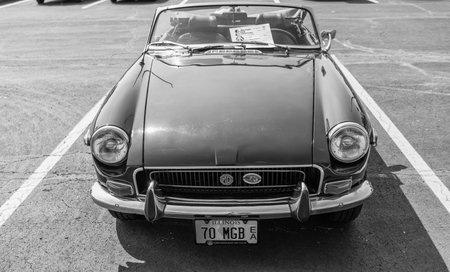 Chicago, Illinois, USA - September 08, 2024: MG MGB sportscar retro convertible vehicle, corner view. Retro green sportscar. Convertible MG MGB car. MG MGB at Chicagoのeditorial素材