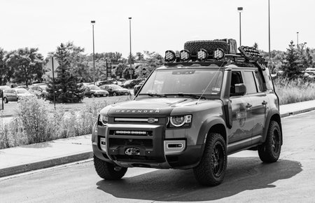 Chicago, Illinois, USA - September 08, 2024: 2022 Land Rover Defender vehicle, side view. Legendary...