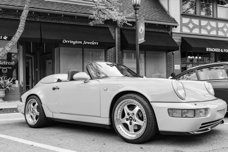 Chicago, Illinois - September 29, 2024: Porsche 911 Carrera Coupe on the road. Porsche 911 Carrera Coupe red color. Porsche 911 Carrera Coupe in Chicago.のeditorial素材