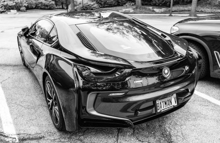 Chicago, Illinois - September 29, 2024: BMW i8 Giga world black color. BMW i8 Giga world parked on the street. back view.のeditorial素材