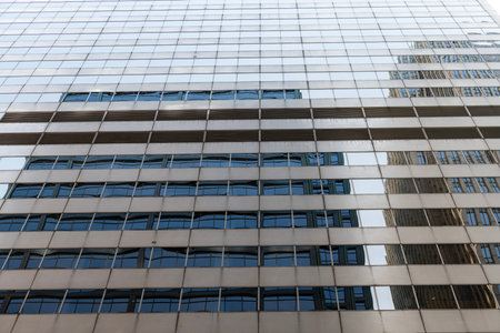 Glass building window. Architectural minimalist. Background of architecture. Modern glass...