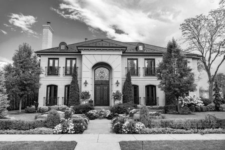 Property in neighborhood. Residential property house. Residence architecture. Suburban neighborhood. Suburban house architecture. Private family house. Neighborhood architecture. Lush gardenの写真素材