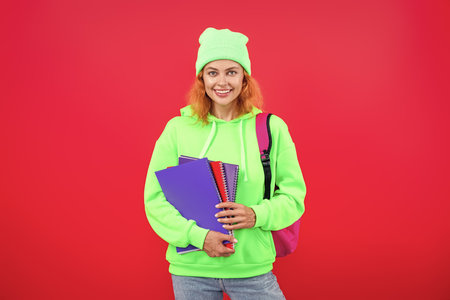 Knowledge day. Education in university. Woman isolated on pink. September 1. Knowledge and...
