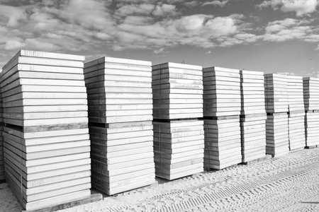 Cement sandwich panel insulation outdoor. Cement industry panel at building construction site. Cement building board. Construction site storage with cement panel. Industry materialの写真素材