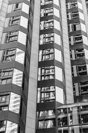 Glass building windows. Architectural detail. Background of architecture. Modern glass background....
