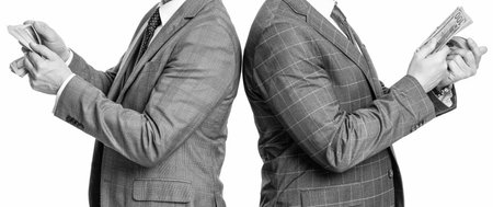 successful businessmen. business success. investment and profit. businessmen holding cash isolated on white. money cash. business men get salary in cash. Millionaire lifestyleの写真素材