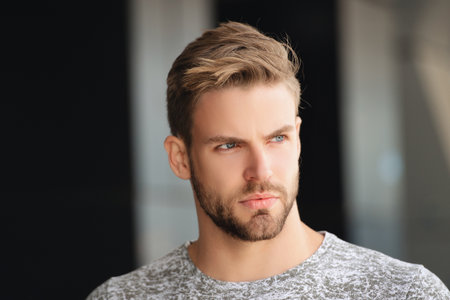 Stylish male. Male casual style. Portrait of millennial guy. Caucasian millennial guy. Man in grey...