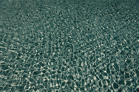Summer vacation at ocean shore. Blue ocean rippled water texture reflection. Ripple water in summer...