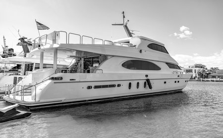 Boat trip. Sea vacation on summer. Luxury boat motor yacht in marina. Luxury yacht. Boating and...