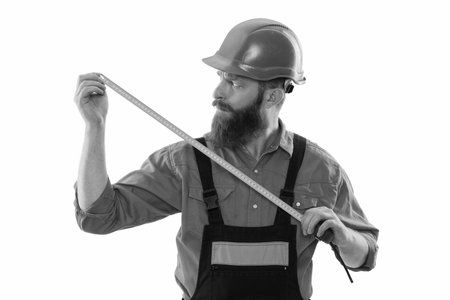 Man builder worker. Builder isolated white. Man builder engineer. Architect measuring size. Tape...