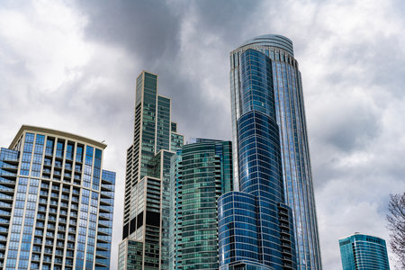 City architecture. Modern glass building. Reflective glass architecture. Architecture in business...