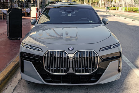 Miami, Florida, USA - November 21, 2024: grey BMW i7 2024 electric sedan. Luxury sedan car of BMW i7. Electric car of BMW i7 parked outdoor. BMW i7, front view.のeditorial素材