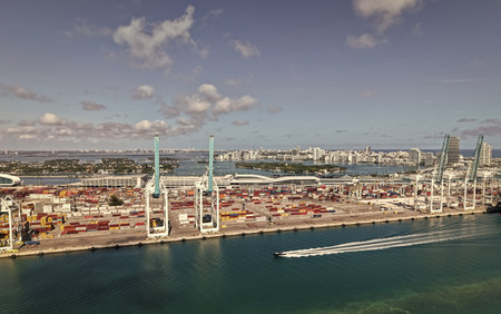 Miami, Florida - February 04, 2025: Maritime shipping. Port of Miami. Cargo shipping container storages in Miami, aerial view. Freight container, maritime. Aerial Miami port with cargo containerのeditorial素材