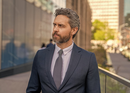 Business success man outdoor. Businessman before business successful meeting in city. Business success of businessman. Businessman in suit. Top manager, Investment banker. Rich man in suitの写真素材