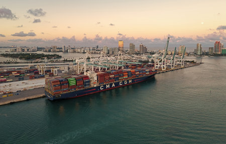 Miami, Florida - February 11, 2025: Export and import. Port of Miami. Cargo ship loaded with container in Miami, aerial. Freight container. Aerial Miami port with cargo container. Cargo deliveryのeditorial素材