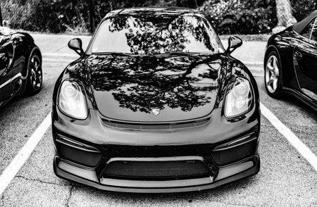 Chicago, Illinois - September 29, 2024: 2016 Porsche Cayman GT4 black color. 2016 Porsche Cayman GT4 parked on the street. front view. 2016 Porsche Cayman GT4 in Chicagoのeditorial素材