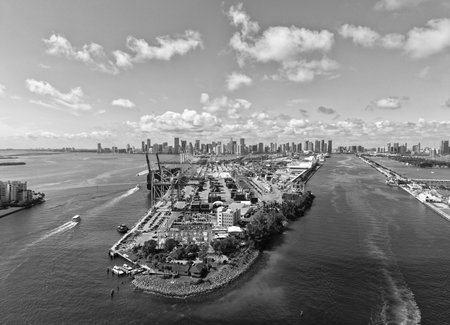 Miami, Florida - February 04, 2025: Maritime shipping. Port of Miami. Cargo shipping container in Miami, aerial. Container terminal. Freight container maritime. Aerial Miami port with cargo containerのeditorial素材