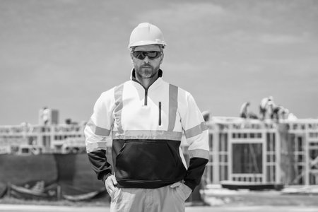 Worker with hardhat. Industry worker at construction. Builder civil engineer at site building....
