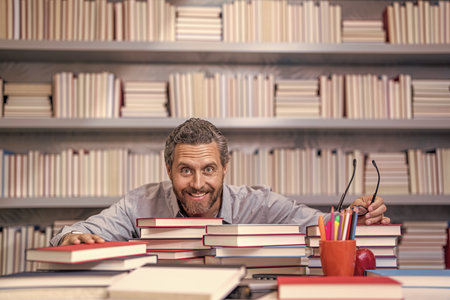 teacher at classroom workplace. hispanic teacher share his knowledge and education. Teacher leading...