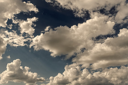 Beautiful view of blue sky with clouds at sunrise. Sky clouds background. Partly cloudy. Background...