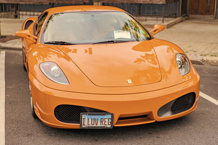 Chicago, Illinois - September 29, 2024: Ferrari F430 orange color. Ferrari F430 parked on the...