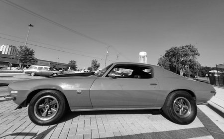 Park Ridge, Illinois, USA - August 21, 2024: Chevy Camaro. Red car parked at auto show, front view....