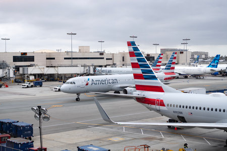 Miami, Florida, USA - April 29, 2025: American airline. American airlines group plane departure in airport. Airport terminal. Plane arrival American airline. Departure and arrival airport terminalのeditorial素材