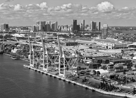 Miami, Florida - February 04, 2025: Maritime shipping. Port of Miami. Cargo shipping container storages in Miami, aerial view. Freight container, maritime. Aerial Miami port with cargo containerのeditorial素材