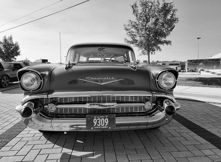 Park Ridge, Illinois, USA - August 21, 2024: Blue car parked at auto show, corner view. Chevrolet Bel Air 1957 retro car. Blue car of Chevrolet Bel Air. Chevy Bel Airのeditorial素材