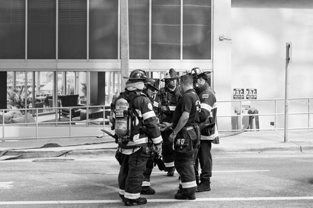 Miami, Florida, USA - December 01, 2024: Fireman of Miami. 911 emergency. Firefighter in uniform....