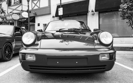 Chicago, Illinois - September 29, 2024: Porsche 911 Carrera Coupe on the road. Porsche 911 Carrera...