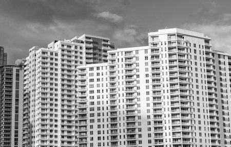 Modern apartment building. Apartment hotel building. Low angle view of building. Residential...