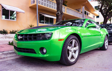 Miami, Florida, USA - July 27, 2025: Chevrolet Camaro coupe 2010 car. Luxury coupe car Chevrolet Camaro. Car Chevrolet Camaro parked outdoor. Green Chevy sportscar, corner viewのeditorial素材