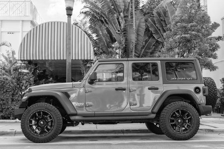 Miami, Florida, USA - December 09, 2024: Jeep Wrangler SUV car. Luxury car of Jeep Wrangler SUV type. Car of Jeep Wrangler outdoor. Jeep Wrangler, side viewのeditorial素材