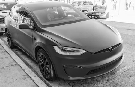 Miami, Florida, USA - December 06, 2024: Tesla X electric crossover car. Electric car of Tesla X type. Car Tesla X parked outdoor. Electric Tesla X, corner viewのeditorial素材