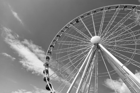 Seattle, Washington, USA, July 25, 2024: Ferris wheel. Amusement park with Ferris wheel. Observation Ferris wheel. Fairground ride on observation wheel. Entertainment park. Copy spaceのeditorial素材
