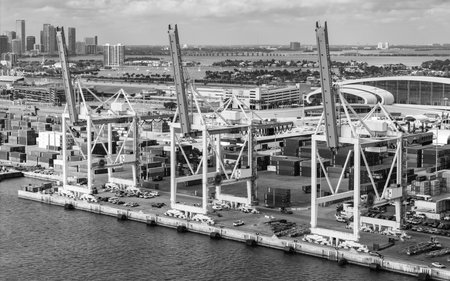 Miami, Florida - February 12, 2025: Freight container, maritime. Aerial Miami port with cargo container. Maritime shipping. Port of Miami. Cargo shipping container in Miami, aerial. Import and exportのeditorial素材