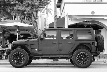 Miami, Florida, USA - December 07, 2024: Luxury SUV car of Jeep Wrangler. Car of Jeep Wrangler on the road. Jeep Wrangler, side view. Jeep Wrangler SUV car.のeditorial素材